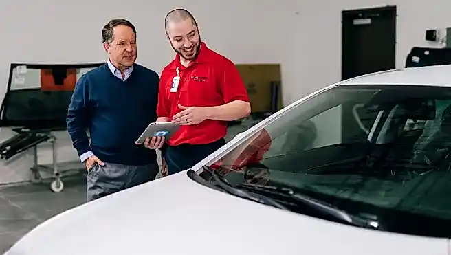 Glass Doctor professional explaining the windshield protection plan.