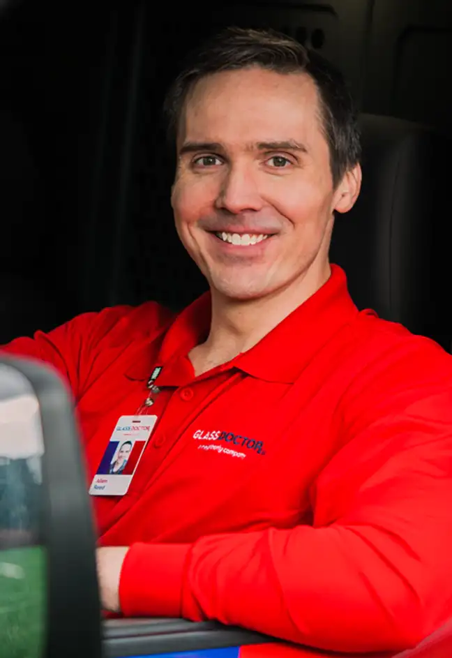 Smiling Glass Doctor professional in van.
